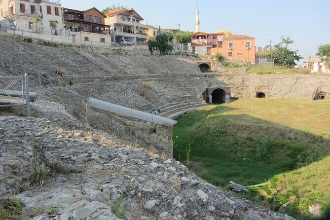 Day tour of Berat UNESCO city , castle and Belshi Lake - Stop at Mangalem: window views, Ottoman patterns, and earthquake scars