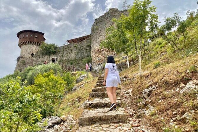 From Tirana: Hiking to Pellumbas Cave and Petrela Castle - Inside Pellumbas Cave: helmets, torches, and karst galleries you can see