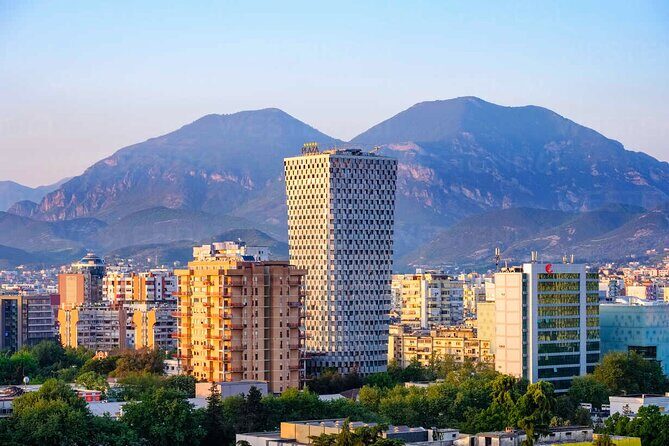 Tirana Bike Tour, History, Culture and Visit to Artificial Lake - Mother Teresa Square: a quick stop that adds a personal lens