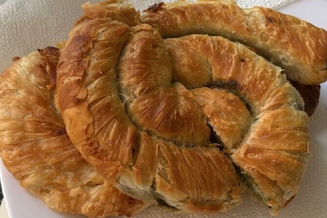 Tirana Guided Street Food Gems Tour (6 dishes, 1 sweet and drink) - Kavaja Street snack choice: buke me qofte or peskavica