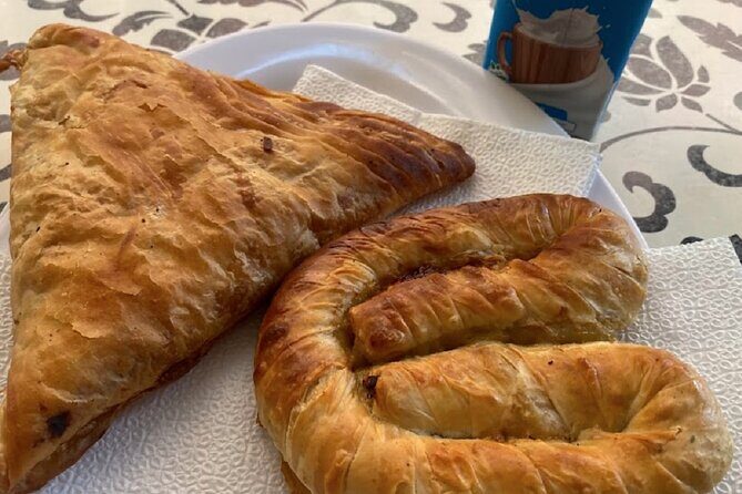 Tirana Guided Street Food Gems Tour (6 dishes, 1 sweet and drink) - Parliament area and Tanners Bridge: pispili taste with a historic walk