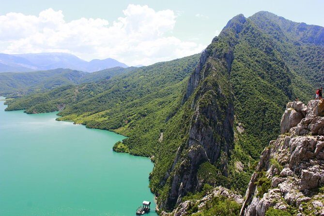 Tirana Walking Tour and Bovilla Lake (3-6 Pax) - Bulevardi Dëshmorët e Kombit: the big boulevard and the regime landmarks
