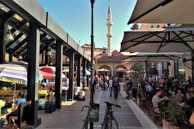 Tirana Walking Tour, Extra Virgin Olive Oil and Raki Tasting - Skanderbeg Square and the Clock Tower: where political power used to take center stage