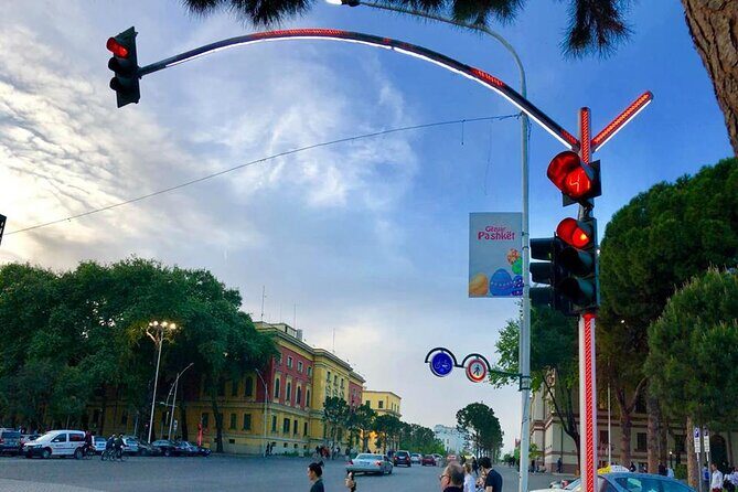 Tirana Walking Tour: History, Culture &Gems by a Passionate Guide - Postbllok, the Enver Hoxha villa, and Blloku’s shift from restricted zone to nightlife