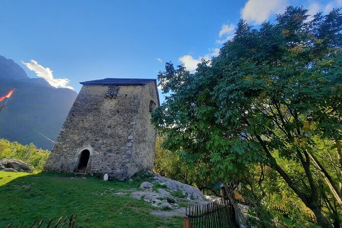 Tour of Komani, Valbona, Thethi, Blue Eye in three days - Grunasi Waterfall: a 25-meter drop with a rainbow angle